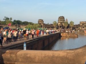 the scene at the bridge into Angkor Was